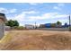 Generous backyard offering flexibility for landscaping and recreation, complemented by surrounding mature trees and fencing at 5617 Alfred Dr, Las Vegas, NV 89108