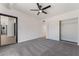 Neutral bedroom with a ceiling fan, carpet, large closet, and contemporary door frames at 5617 Alfred Dr, Las Vegas, NV 89108