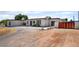 Single-story home showcasing a well-kept front yard and custom gate at 5617 Alfred Dr, Las Vegas, NV 89108
