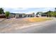 Single-story home with expansive gravel yard and additional structure at 5617 Alfred Dr, Las Vegas, NV 89108