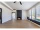 An open concept living room that features a striking fireplace and lots of natural light at 5617 Alfred Dr, Las Vegas, NV 89108