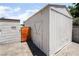 An outdoor shed with a modern fence and brick walls at 5617 Alfred Dr, Las Vegas, NV 89108