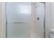 Close up of a bright shower with a glass enclosure, sleek fixtures, and modern design at 5617 Alfred Dr, Las Vegas, NV 89108