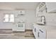 Beautiful kitchen featuring white cabinetry, modern countertops, and ample natural light at 603 W Adams Ave, Las Vegas, NV 89106