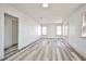 Spacious living room with ample natural light and contemporary flooring at 603 W Adams Ave, Las Vegas, NV 89106