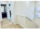 Hallway with carpeted floors leading to the bathroom and bedroom at 6043 Cape Clairmont Ct, North Las Vegas, NV 89031