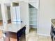 Modern kitchen featuring stainless steel appliances, granite countertops, and a pantry at 6043 Cape Clairmont Ct, North Las Vegas, NV 89031