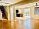 Open-concept living space flows into the kitchen, featuring sleek floors and natural light, perfect for modern entertaining at 6043 Cape Clairmont Ct, North Las Vegas, NV 89031