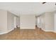 Spacious living room with tile flooring and neutral paint, ready for personalization and comfortable living at 612 Moontide Ct, Henderson, NV 89011