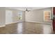 A bright living room with tile floors, neutral walls, and plenty of natural light at 612 Moontide Ct, Henderson, NV 89011