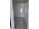 Entryway view with decorative glass door and neutral tile flooring at 6402 Agua Dr, Las Vegas, NV 89103