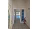 Front entryway featuring decorative door and tile flooring leading to living area at 6402 Agua Dr, Las Vegas, NV 89103