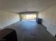 Attached two car garage with open garage door and additional storage space, perfect for convenience and organization at 6402 Agua Dr, Las Vegas, NV 89103