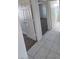 Hallway featuring tile floors, leading to the bedroom and bathroom at 6402 Agua Dr, Las Vegas, NV 89103