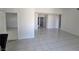 Spacious, bright, open-concept living area with tile flooring throughout at 6402 Agua Dr, Las Vegas, NV 89103