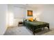Cozy bedroom with natural light, soft carpet, and a neutral color palette at 6927 Desert Finch St, North Las Vegas, NV 89084