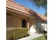 Inviting single-story home with neutral-toned exterior, well-maintained landscaping, and a classic terracotta tile roof at 728 Apple Tree Ct, Henderson, NV 89014