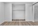 This spacious walk-in closet features smooth flooring, clean white walls, and built-in shelving at 747 Greenbriar Townhouse Way, Las Vegas, NV 89121