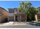 Charming two-story home with a well-maintained yard and inviting entryway at 7537 Brisa Del Mar Ave, Las Vegas, NV 89179