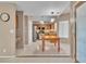 Traditional kitchen with wooden cabinets, stainless steel appliances, and a light-filled breakfast area at 7720 Leavorite Dr, Las Vegas, NV 89128