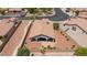 An aerial view of the house, showing the back yard and covered patio at 7816 Glowing Peak St, Las Vegas, NV 89131