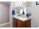 Bathroom featuring a modern vanity, faucet, and neutral color palette at 7816 Glowing Peak St, Las Vegas, NV 89131