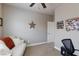 Bedroom showcases neutral tones, comfortable seating and decor at 7816 Glowing Peak St, Las Vegas, NV 89131
