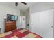 Bedroom featuring a wooden dresser and closet with sliding doors at 7816 Glowing Peak St, Las Vegas, NV 89131