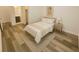 A bedroom with a bed, side table, and decorative elements offering inviting space at 8550 Lost Pony St, Las Vegas, NV 89148