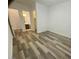A bedroom with a light and airy ambiance showcasing durable wood-look floors at 8550 Lost Pony St, Las Vegas, NV 89148