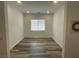 Open and bright living space with wood flooring and plenty of natural light at 8550 Lost Pony St, Las Vegas, NV 89148