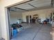 Spacious garage with ample storage and an additional refrigerator for convenience at 871 Buol Rd, Pahrump, NV 89048