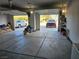 Large two car garage featuring vehicle access on both sides for added convenience at 871 Buol Rd, Pahrump, NV 89048