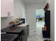 Well-organized laundry room with modern appliances and convenient storage solutions at 871 Buol Rd, Pahrump, NV 89048