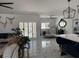 Open concept living room and kitchen area with stylish decor and elegant finishes at 871 Buol Rd, Pahrump, NV 89048