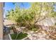 Enjoy the private backyard that offers plenty of shade from mature trees at 9022 Sosa Creek Ave, Las Vegas, NV 89149
