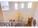 Bright foyer with tile flooring, high ceilings, and three windows, offering plenty of natural light at 9022 Sosa Creek Ave, Las Vegas, NV 89149