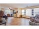 Spacious living room with lots of natural light, neutral paint, and tile flooring at 9022 Sosa Creek Ave, Las Vegas, NV 89149
