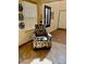 Sitting area with neutral walls, plantation shutters and tile flooring at 9022 Sosa Creek Ave, Las Vegas, NV 89149