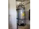 The image shows a well-maintained water heater, essential for providing hot water throughout the property at 9022 Sosa Creek Ave, Las Vegas, NV 89149