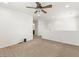 Versatile loft area with neutral carpet, recessed lights, and access to a bathroom at 9268 Wildfire Gorge St, Las Vegas, NV 89139