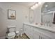 Bathroom featuring double sinks, modern lighting, and ample counter space at 9340 W Washburn Rd, Las Vegas, NV 89149