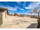 Wide driveway leading to this single story home; with gated entry at 9340 W Washburn Rd, Las Vegas, NV 89149