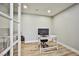 Bright office space with modern desk, neutral walls and wood-look floors at 9340 W Washburn Rd, Las Vegas, NV 89149