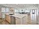 Beautiful kitchen with a modern island, stainless steel appliances, and an open-concept design at 9340 W Washburn Rd, Las Vegas, NV 89149