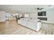 Bright, airy living space boasts modern fireplace, open layout with easy access to dining, and kitchen at 9340 W Washburn Rd, Las Vegas, NV 89149
