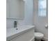 Modern bathroom featuring a white vanity, sleek faucet, and a clean, minimalist design with natural light at 1013 Corsica Ln, Las Vegas, NV 89144
