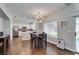 Stylish dining area features a modern light fixture and connects to the kitchen at 1013 Corsica Ln, Las Vegas, NV 89144