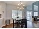 Sunlit dining area featuring access to backyard and kitchen views at 1013 Corsica Ln, Las Vegas, NV 89144