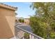 Enjoy the view from this balcony, overlooking a neighborhood and mountains in the distance at 10437 Coyote Cub Ave, Las Vegas, NV 89129